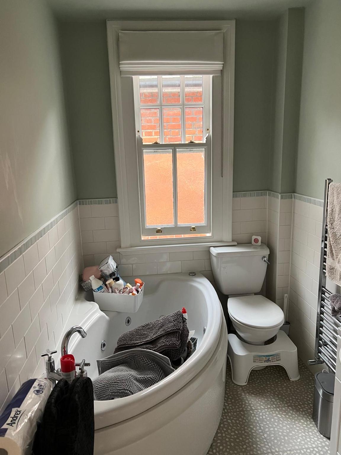 Blue and gold luxury wetroom before renovation