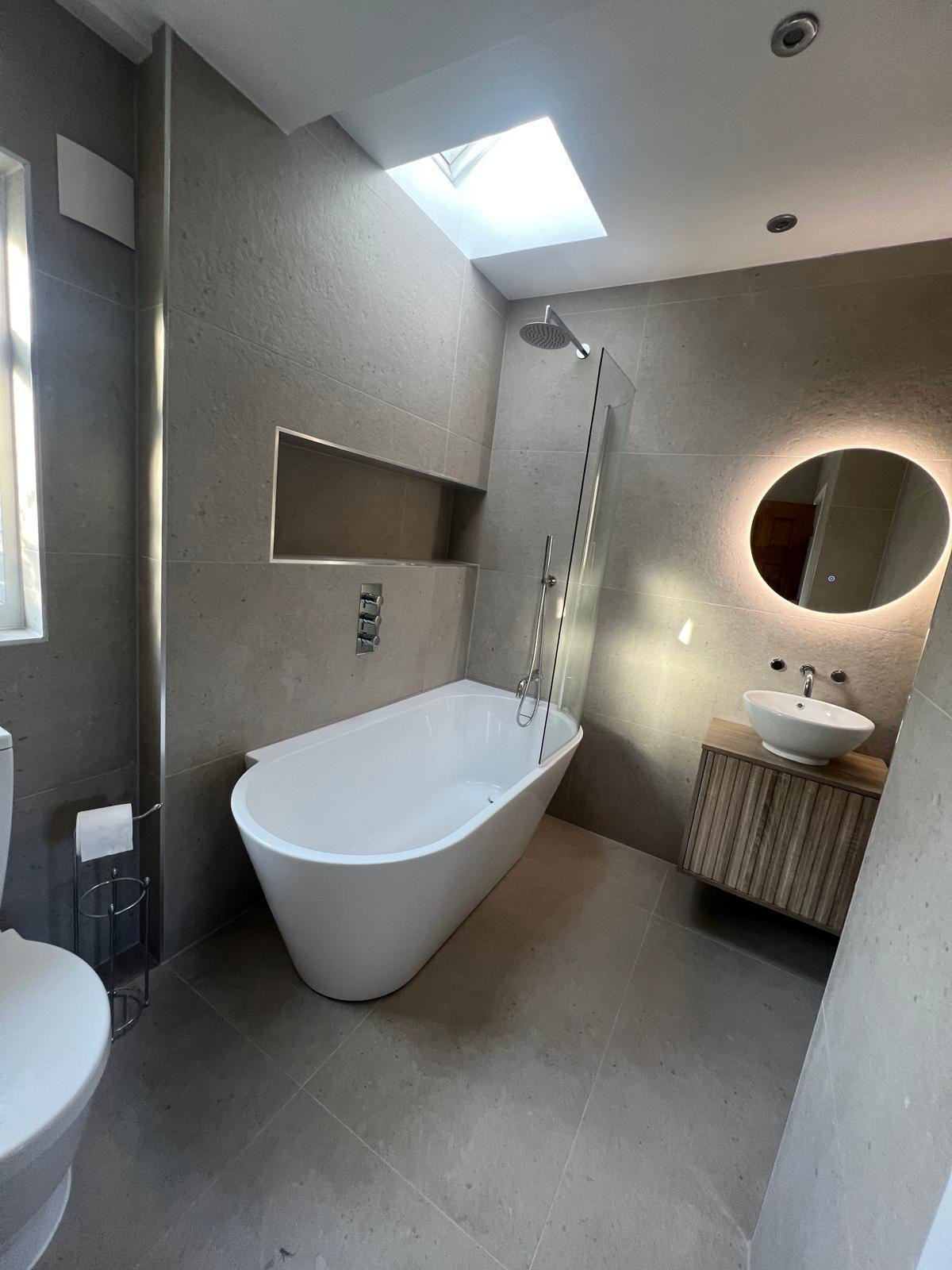 Completed contemporary stone-effect bathroom