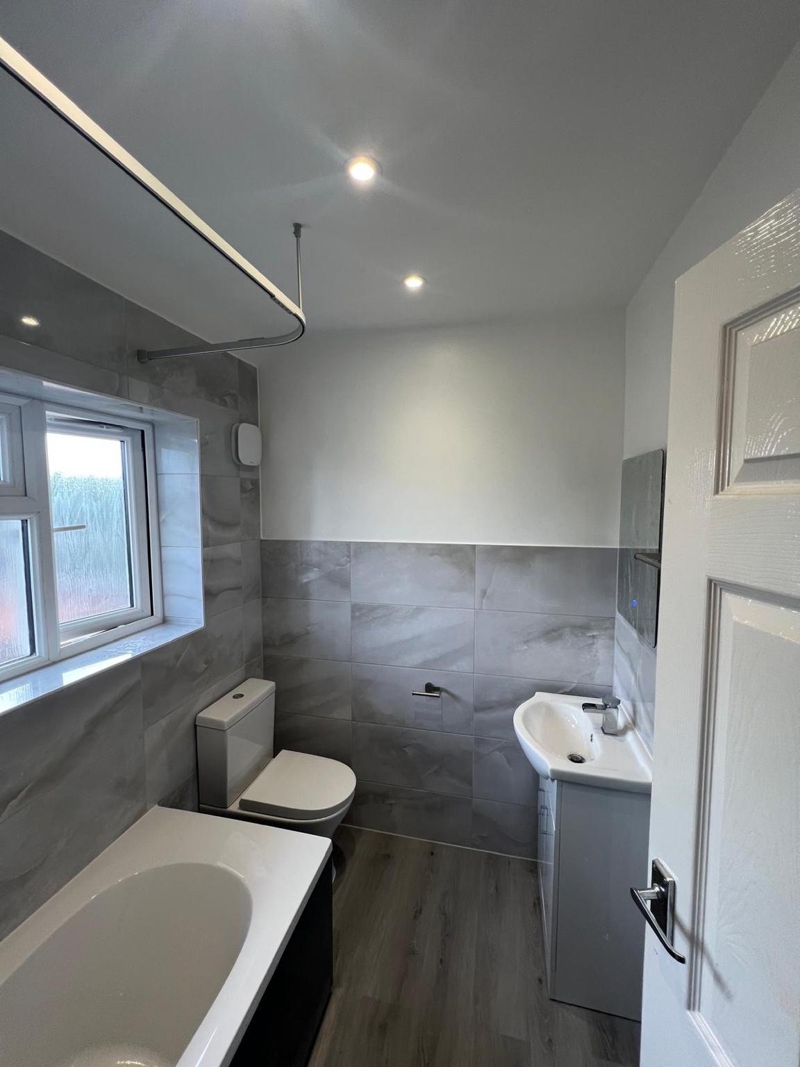 Grey Marble-Effect Family Bathroom — completed bathroom
