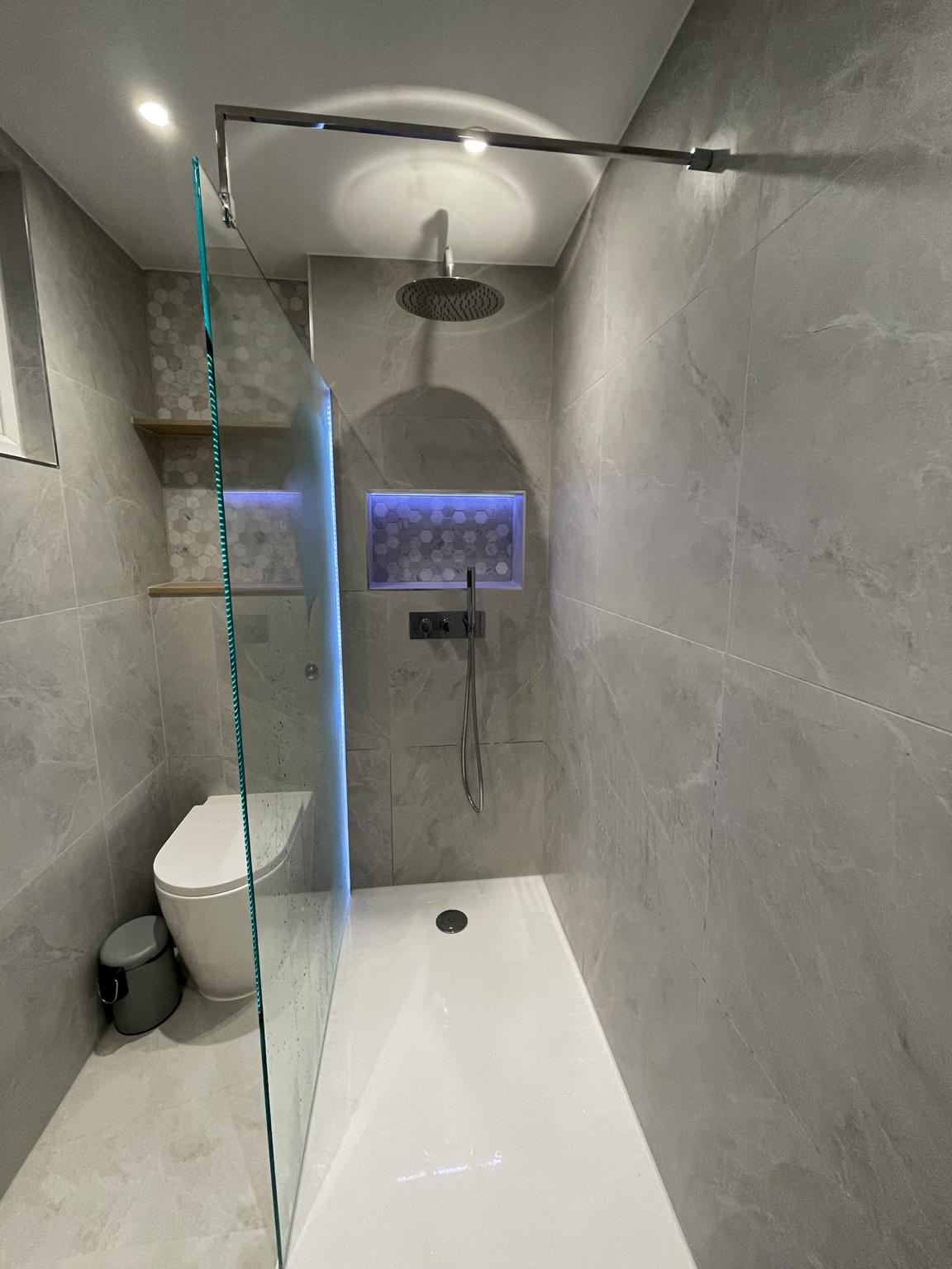 Bathroom with Illuminated Shower Screen — completed bathroom