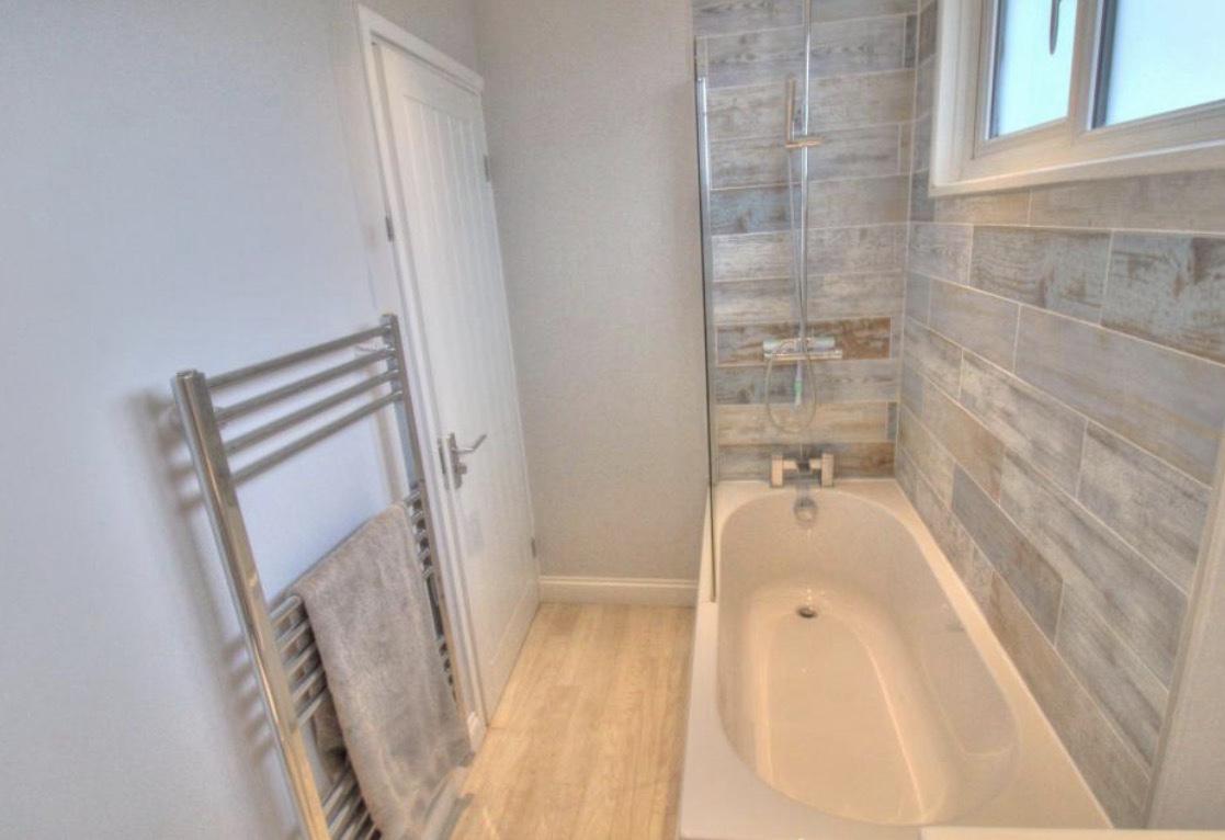 Original bath and shower from the opposite angle