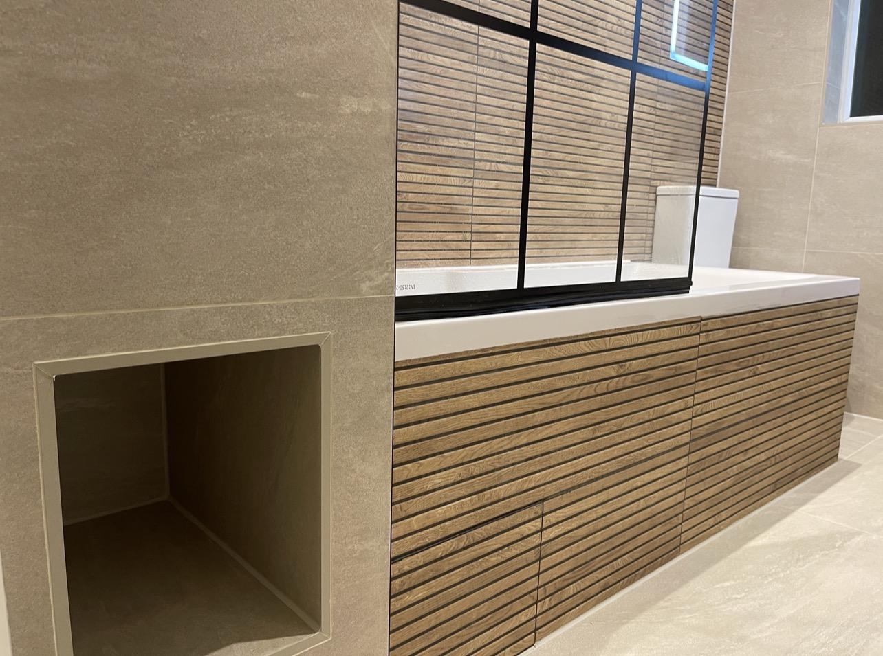 Recessed niche in ribbed wood-effect wall