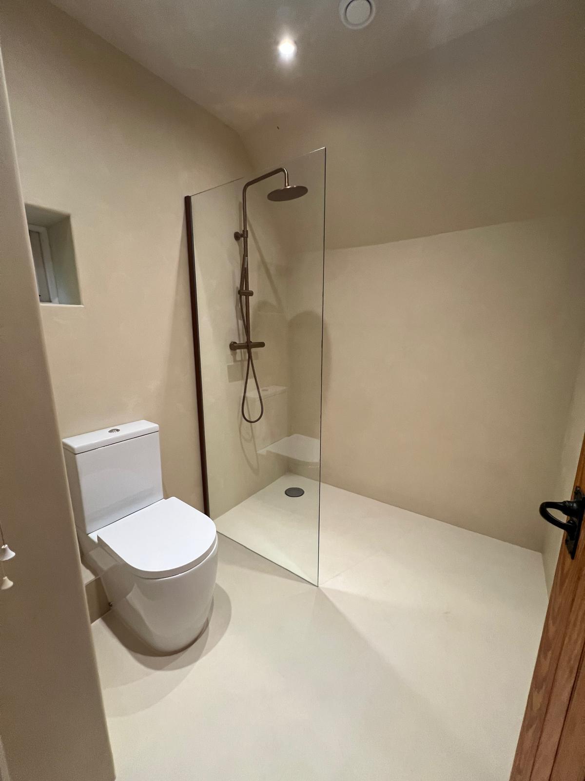 Seamless microcement wetroom — completed bathroom