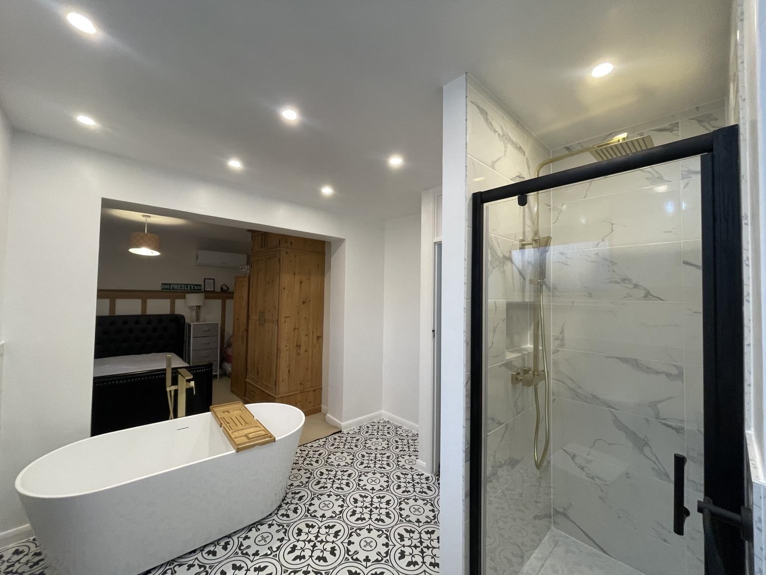 Open-Plan Bedroom & Bathroom Transformation — completed bathroom