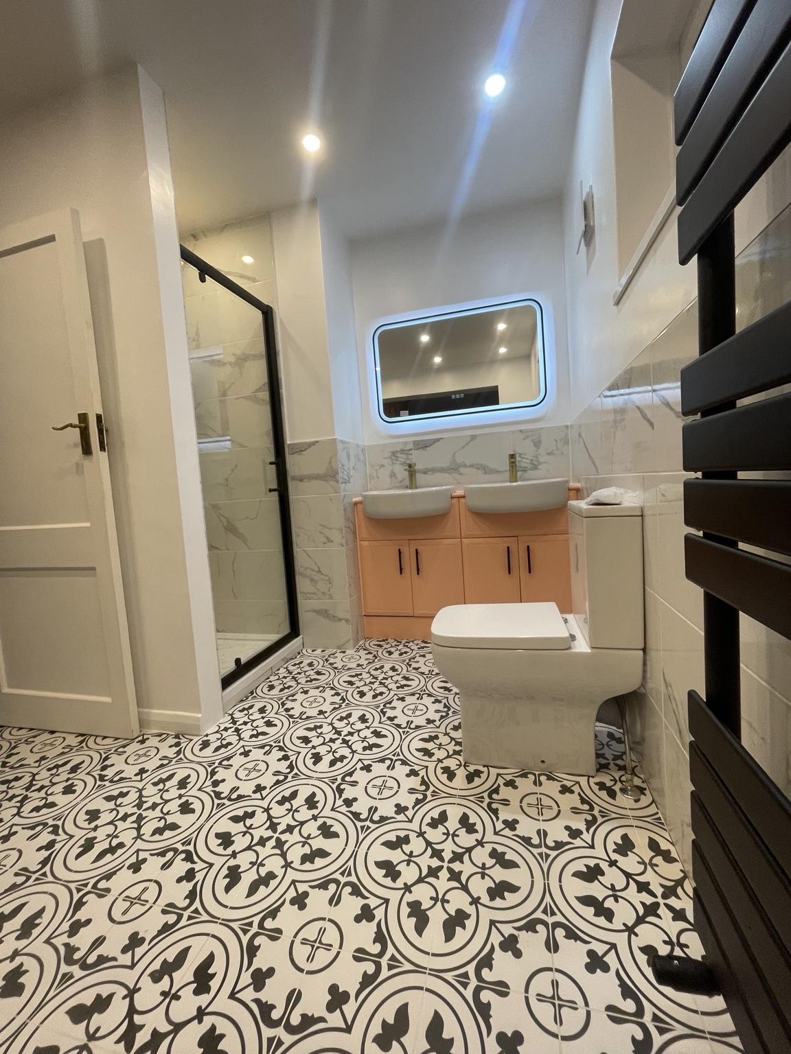 Patterned floor and double vanity