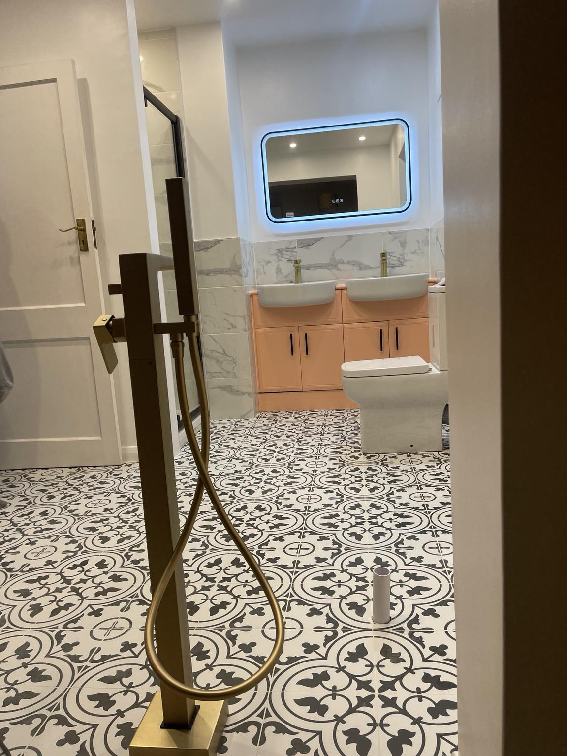 Double vanity and illuminated mirror