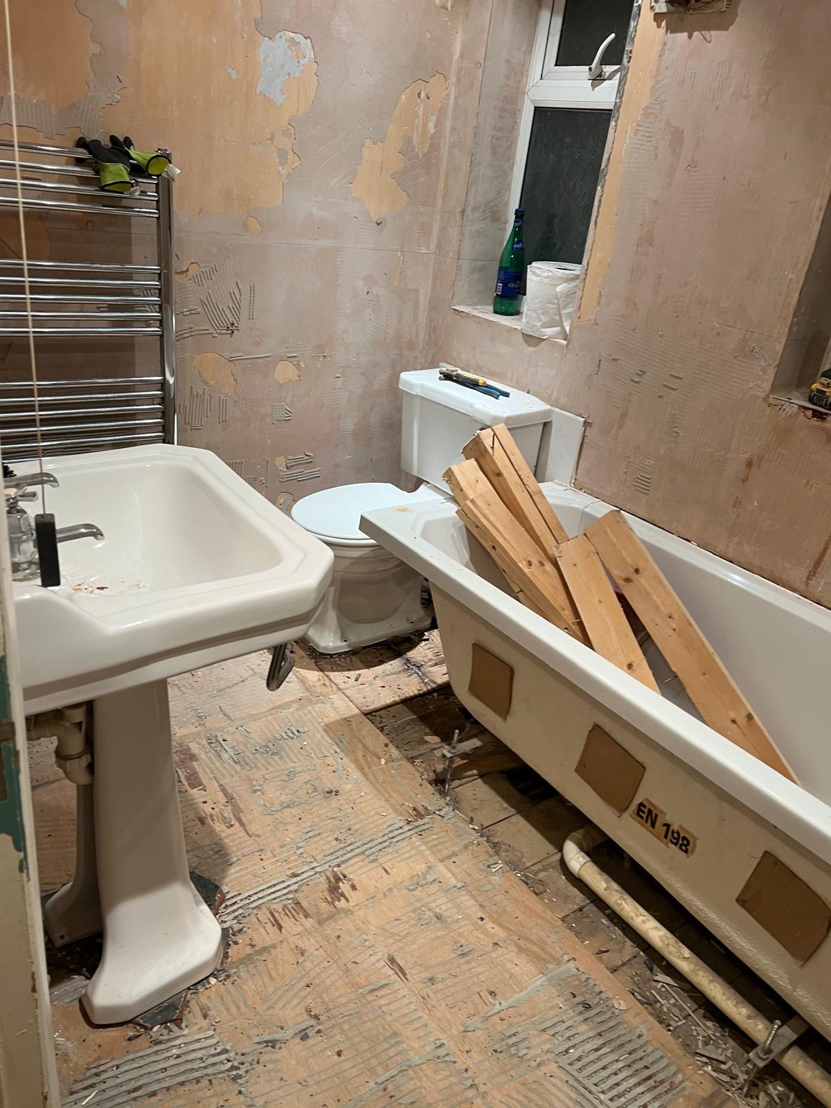 Previous bath area during demolition