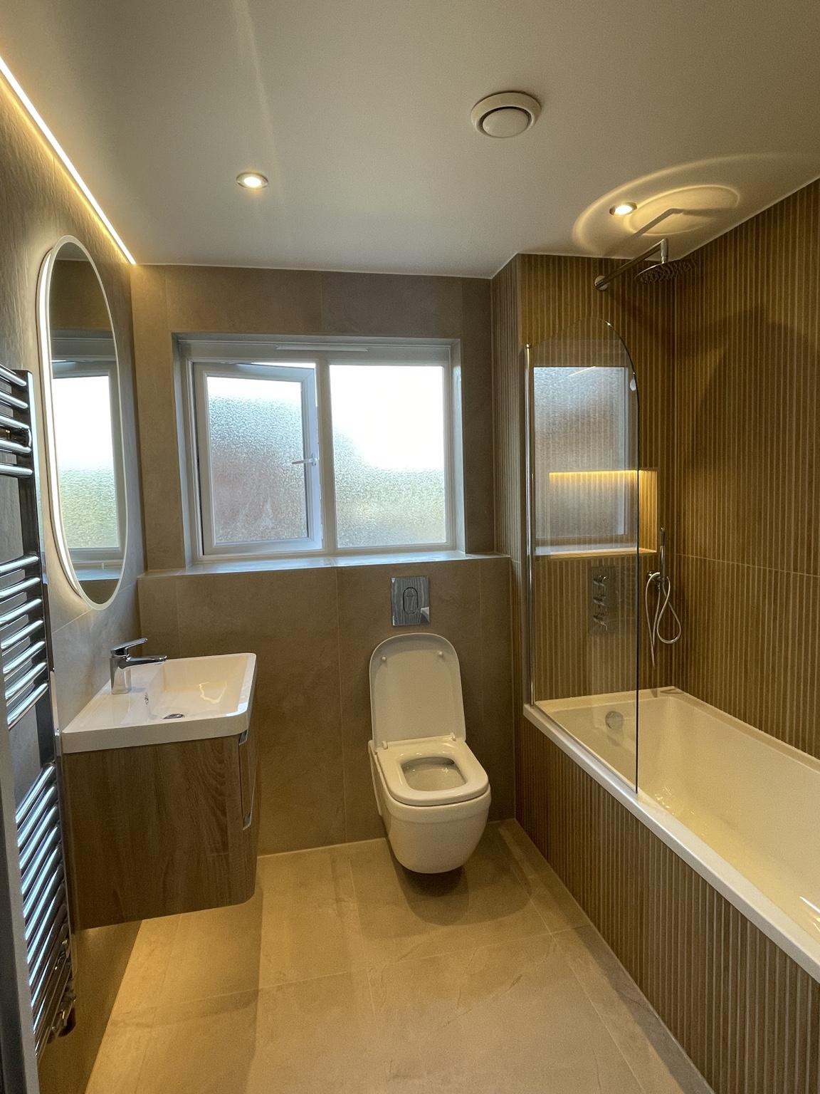 Wood-Effect Bathroom with Illuminated Vanity — completed bathroom